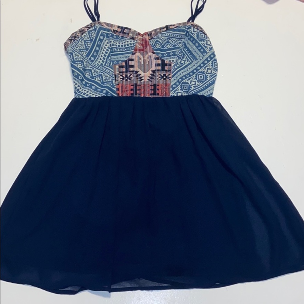 Navy dress with patches and beautiful sewing